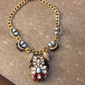 Chunky statement piece necklace. Chain is gold.